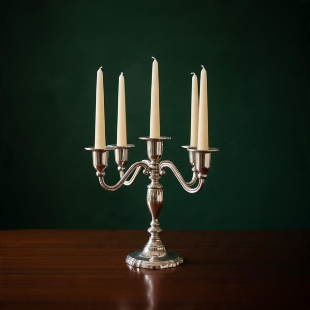 Vintage 1996 International Silver Company five-light silverplated candelabra, featuring four gracefully curved arms, a...
