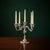 Vintage 1996 International Silver Company five-light silverplated candelabra, featuring four gracefully curved arms, a...