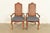 A gorgeous pair of French Provincial Louis XV style armchairs or dining captain chairs In the manner of Baker Furniture...
