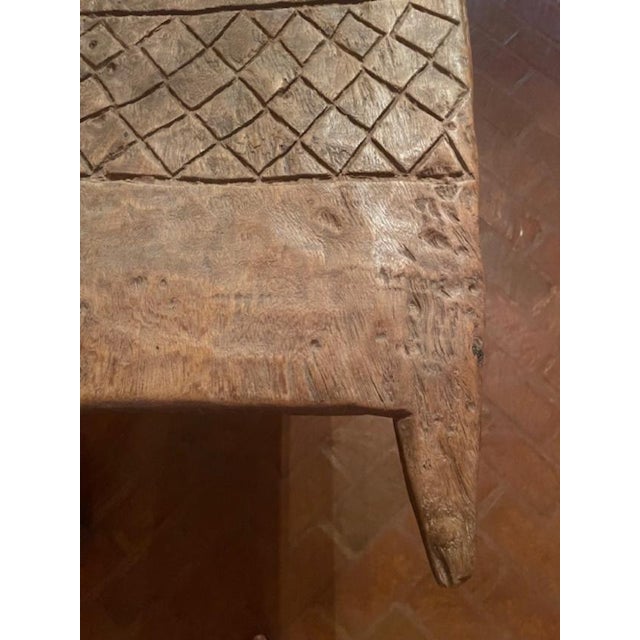 This carved wooden door was in a storage container that came from Zimbabwe. I believe it was for a hut etc. Great decor or...