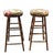 A pair of mid 20th Century turned, stained walnut and Upholstered bar stools. Measure 15.5" in width, 15.5" in depth and...
