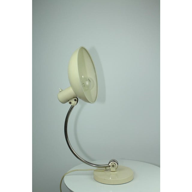 Designed around 1938, this table lamp was produced by Koranda in Vienna around the 1940s to 1950s. I have official proof...