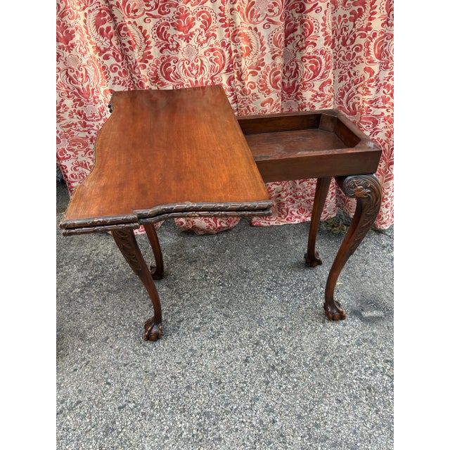 Georgian Mahogany Gaming Table. Finely Carved Legs depicting a Serpent and Ball and Claw Talons ,also Top has Drape and...