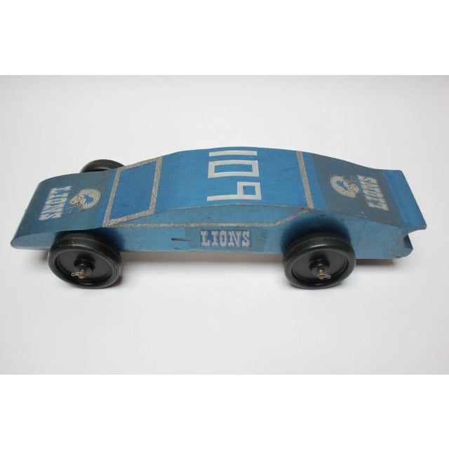 Ca. 1970s USA vintage handmade model car in metallic blue with Detroit Lions applied graphics (stickers or transfers) and...