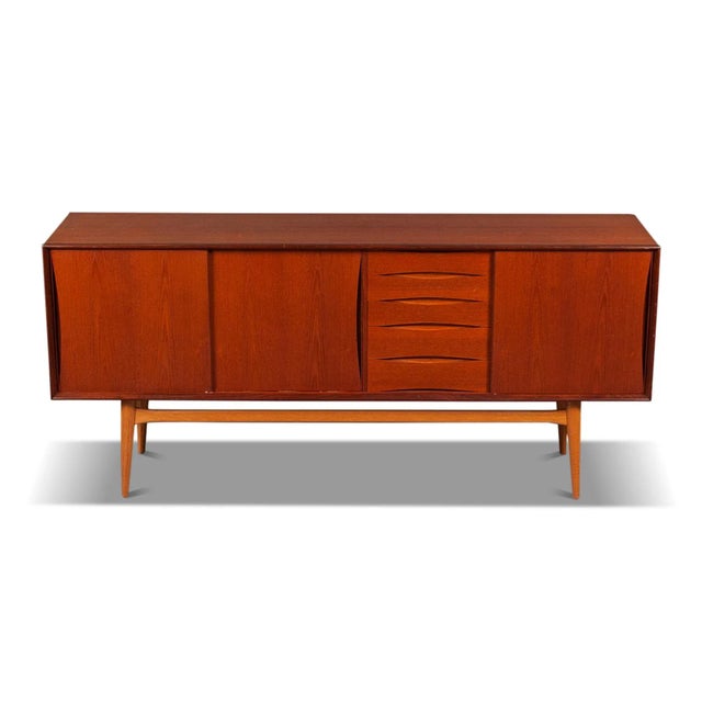 Origin: Norway Designer: Fredrik Kayser Manufacturer: Unknown Era: 1960s Materials: Teak Measurements: 76.75″ wide x 19″...