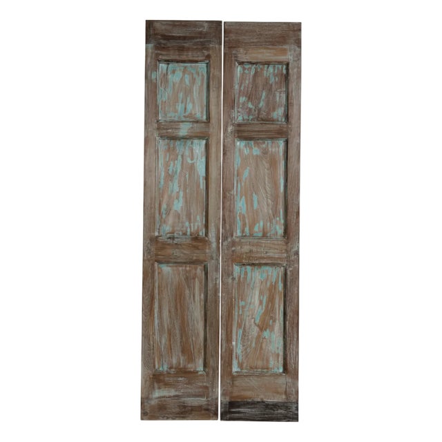 Bring old-world craftsmanship into your home with this stunning pair of vintage carved double doors. Hand-crafted from...