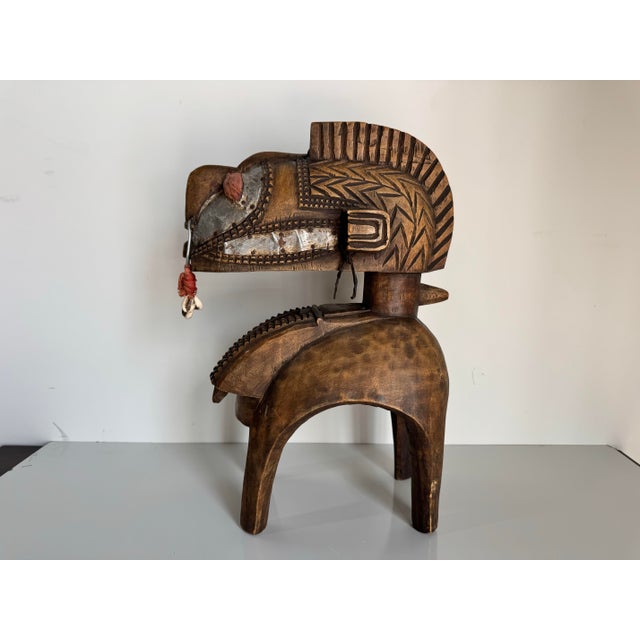 This striking Vintage African Baga Nimba Tribal Mask Sculpture from Guinea is a stunning representation of traditional...