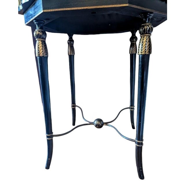 This collectible antique birdcage is made from copper and brass and features ornate architectural details. The bird cage...