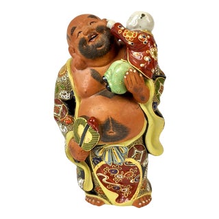 Japanese Kutani Ware Happy Buddha Holding Baby For Sale