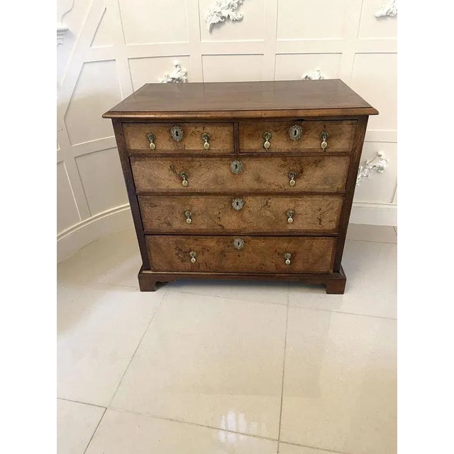 Antique George I quality walnut chest of drawers having a quality walnut rectangular top with a moulded edge above two...