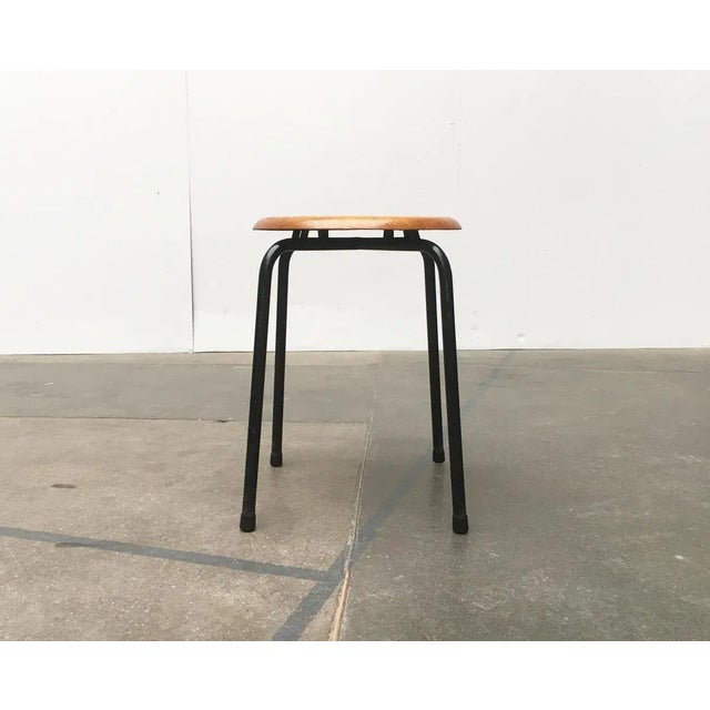 Schlichter stool from the danish manufacturer mh stalmöbler. a very functional design. A seating surface of wood at a...