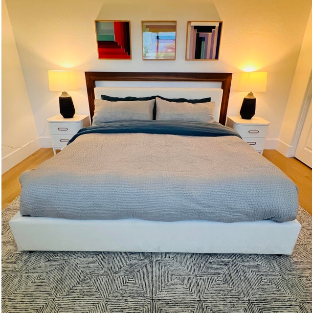 A refined Restoration Hardware silk pick stitch quilt in the soft “Mist” colorway, accompanied by matching king shams....