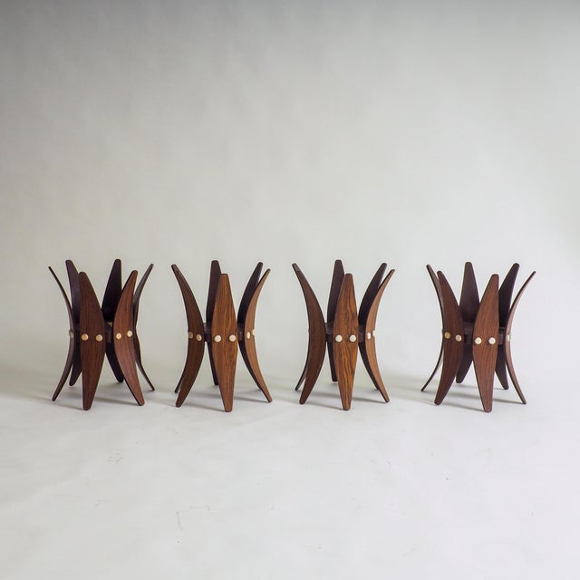 A Rare set of four Mid-Century Modern Sculptural Plant Stands This exceptional set of four vintage plant stands represents...