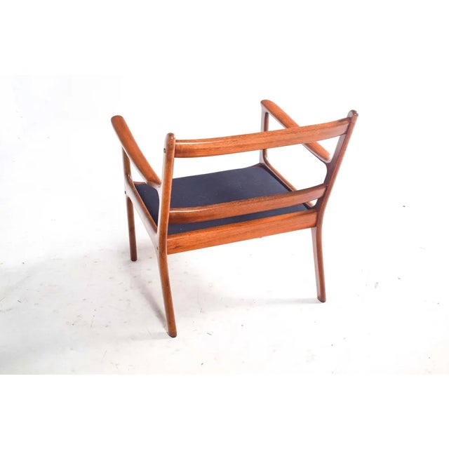 One scandinavian modern easy chair model PJ 112 in teak manufactured by Poul Jeppesen in Denmark 1960s. This delicate...