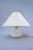 A beautifully preserved model 313 "krone" table lamp produced by le klint, denmark, during the 1950s. Combining an elegant...