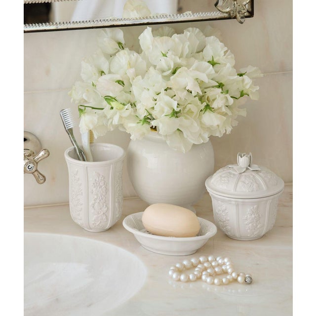 Inspired by 19th century Italian decor, this ceramic soap dish is beautifully decorated with a relief floral pattern....