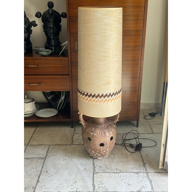 Ceramic floor lamp, authentic piece from France, 1970. This lamp combines elegant design with the functionality of dual...