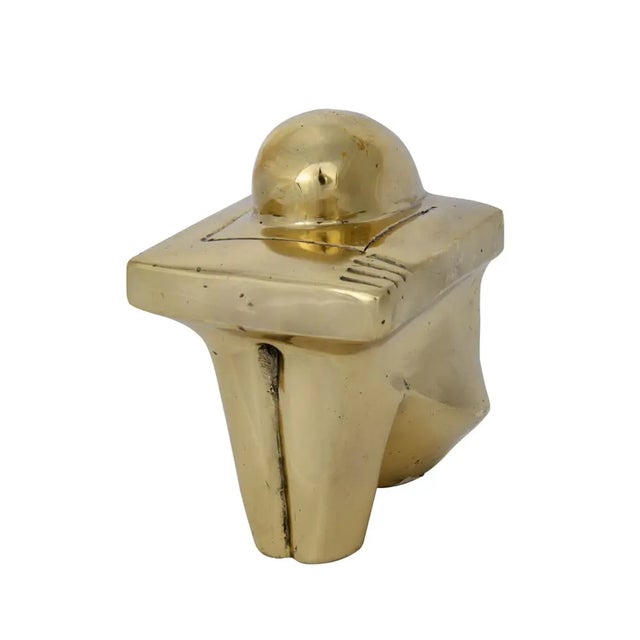 Is she sad, contemplative, or at prayer? The answer is in the eye of the beholder. This handcrafted burnished brass piece...