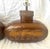 Vintage pair of ceramic bronze/copper color raised relief table lamps. Elephant motif on front and back with pattern at...