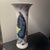 A stunning vintage reproduction of the classic 18th-century Chinoiserie pattern by Mottahedeh. This iconic 11-inch trumpet...