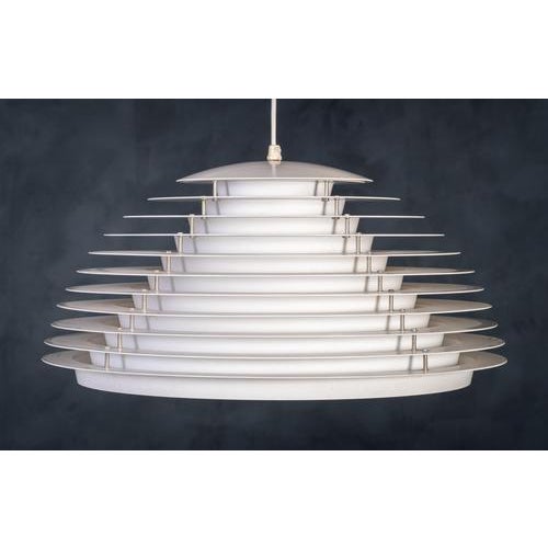 An iconic example of danish design, this "hekla" pendant lamp designed by jon olafsson & petur b. Luthersson and produced...