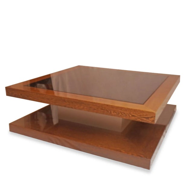 This vintage modern square coffee table reflects the clean lines and balanced proportions of mid-century inspired design....