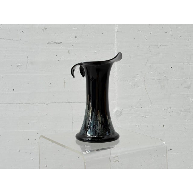 A striking studio glass vase from the german glassworks eisch, meticulously handcrafted. The vase impresses with its...