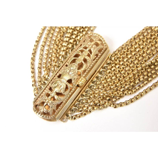 This is part of Chairish’s Costume Jewelry assortment. This stunning and unusual vintage multi strand bead necklace has an...
