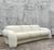 A sculptural three-seat sofa by Preview. This iconic piece features Kagan’s signature and exaggerated, rounded arms that...