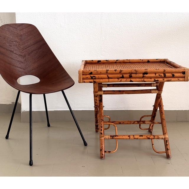 Beautiful side table with removable tray, made in France in the 1950s. The tray and table legs are made of lacquered real...