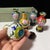 Set of 5 Miniature Chinese Cloisonné Vases | Floral Motif With Wood Stands & Box For Sale - Image 14 of 15