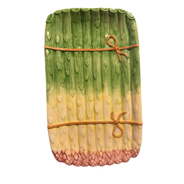 Whether used as a serving platter or displayed on a plate wall, the vibrant pink tips and saturated green stalks are sure...