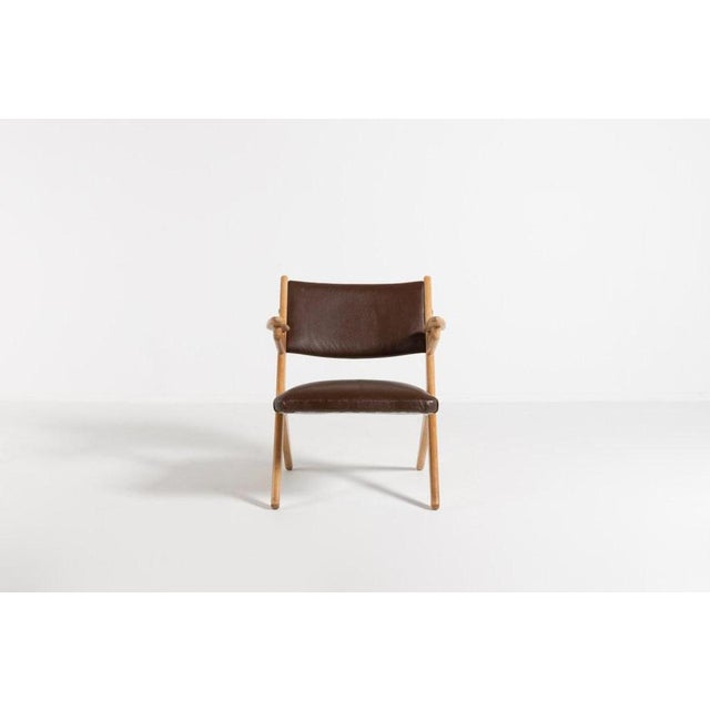 Vintage architectural armchair designed by Arne Hovmand Olsen and produced in Denmark, 1970’s. The seat and backrest is...