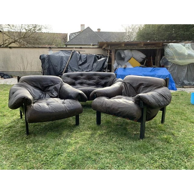 2 armchairs + 1sofa Featuring a solid black painted wood frame with beautiful grain that supports the natural leather...