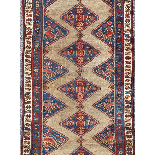 Tribal Antique Persian Sarab Runner Featuring Zigzag Medallions in Tan and Cobalt For Sale - Image 3 of 8