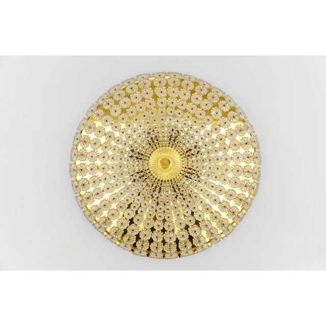 Large flower shaped flush mount designed by emil stejnar in austria, 1960s. eight e14 bulbs on a brass plate. very good...