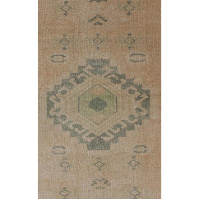 Measures: 3'10 x 5'6 Vintage Oushak rug with central medallion warm green tones and earthy tones, Keivan Woven Arts Rug...