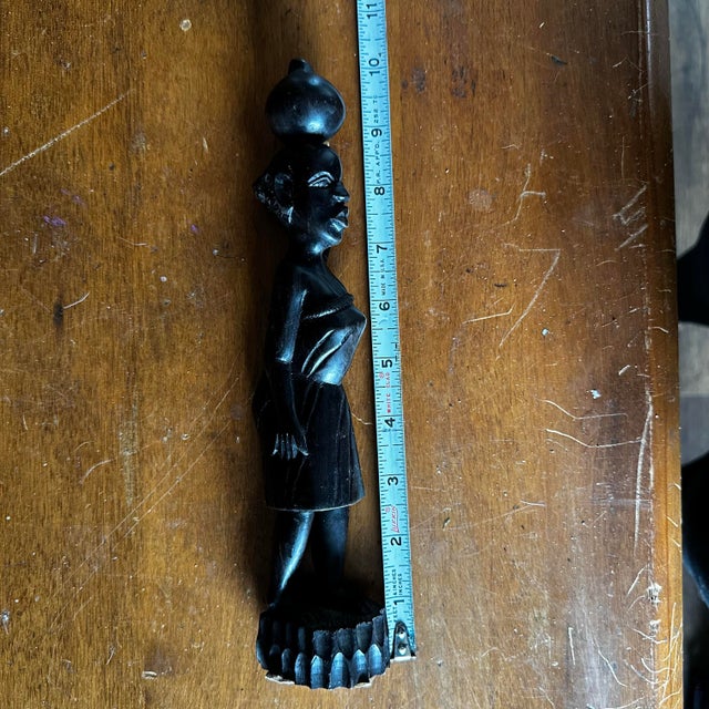 Hand Carved Angola Wood Sculpture Woman Carrying Water Jar African Folk Art 10” A beautifully hand-carved hardwood...