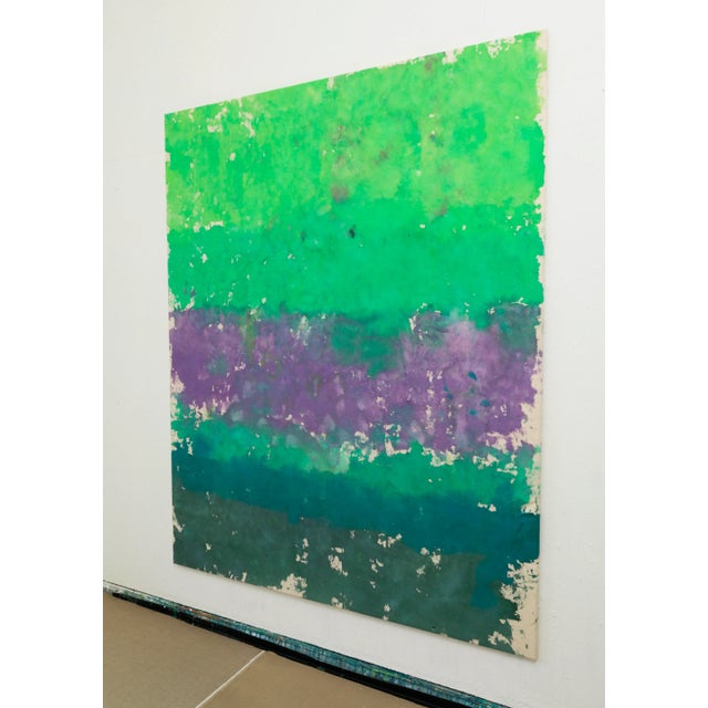 Studio towels were sewn over four cobblestones, and used to make imprints on a cotton canvas. The performance went for 30...