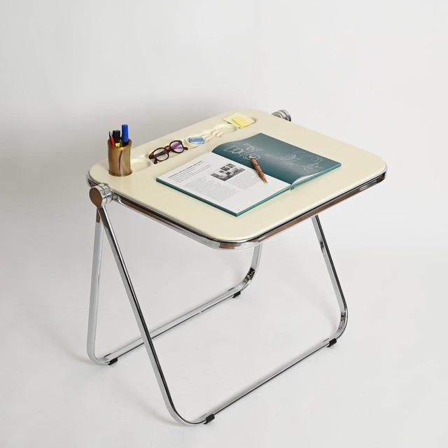 Lovely midcentury off-white "Platone" folding desk designed by Giancarlo Piretti and produced by Anonima Castelli in Italy...