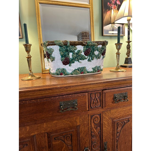 This Barbotine style Majolica jardinere is large enough to make a statement anywhere. Its size perfectly depicts playful...