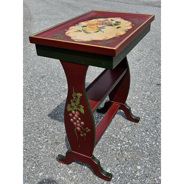 A Vintage Crackle Painted and decorated Two-Tier strecher Side Table measuring 20" in width, 13" in width and standing...