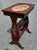 A Vintage Crackle Painted and decorated Two-Tier strecher Side Table measuring 20" in width, 13" in width and standing...