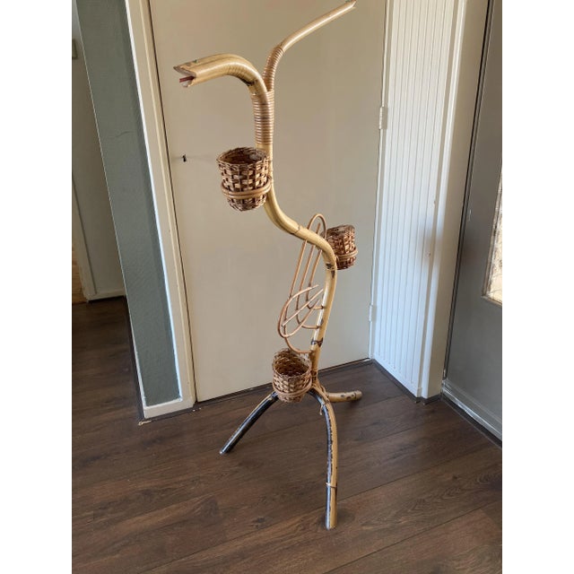 Vintage Mid-Century Bamboo and Rattan Flower or Plant Stand. This piece has an attribution mark, I am sure that it is...
