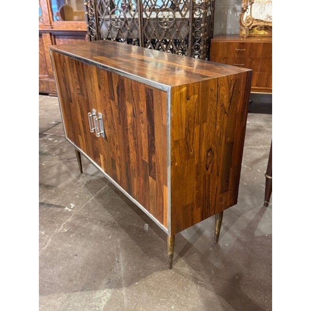 Italian Mid-century patch work oak side cabinet. An Italian mid‑century patchwork oak side cabinet is one of those pieces...