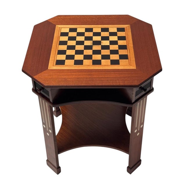 Magnificent and rare Vienna Secession chess table or game table. Striking Austrian design from the 1900s. Solid walnut and...