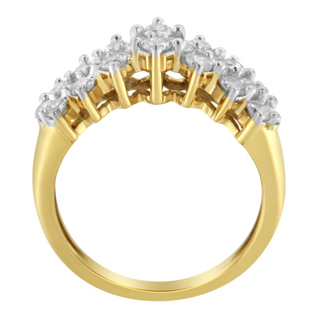 This diamond cluster band features 22 diamonds horizontally prong set in three rows along the 10 karat yellow gold band....