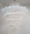 Italian chandelier shown with opaline hand blown Palmette Murano glass leaves arranged in six tiers including a crown at...