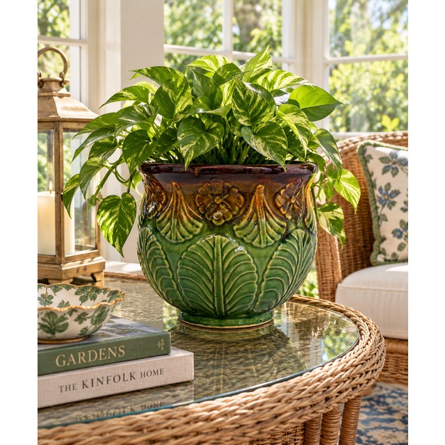 A charming majolica cachepot made by the Weller Art Pottery Company. Circa 1900-1915. This lovely piece, part of Weller's...