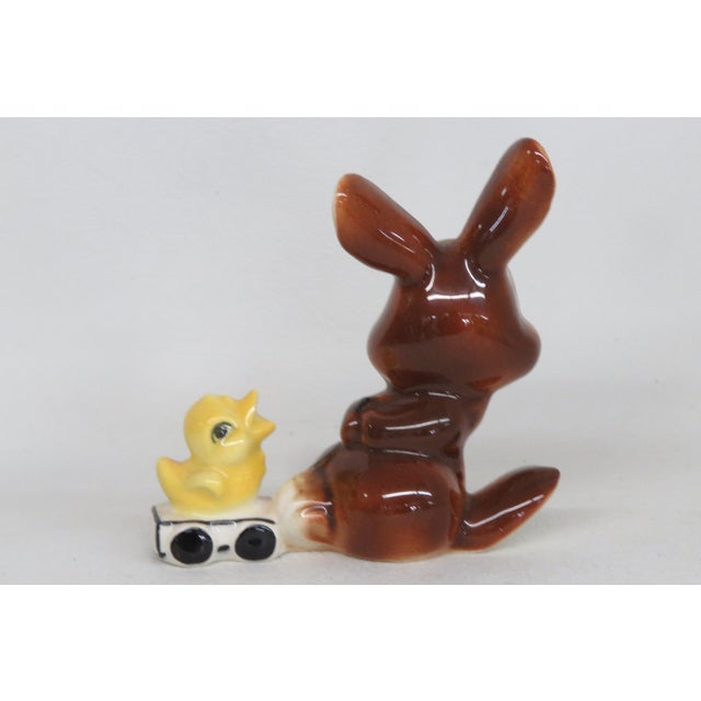 This charming miniature figurines is made of porcelain. This lovely piece is labeled as being made by Goebel in Germany,...